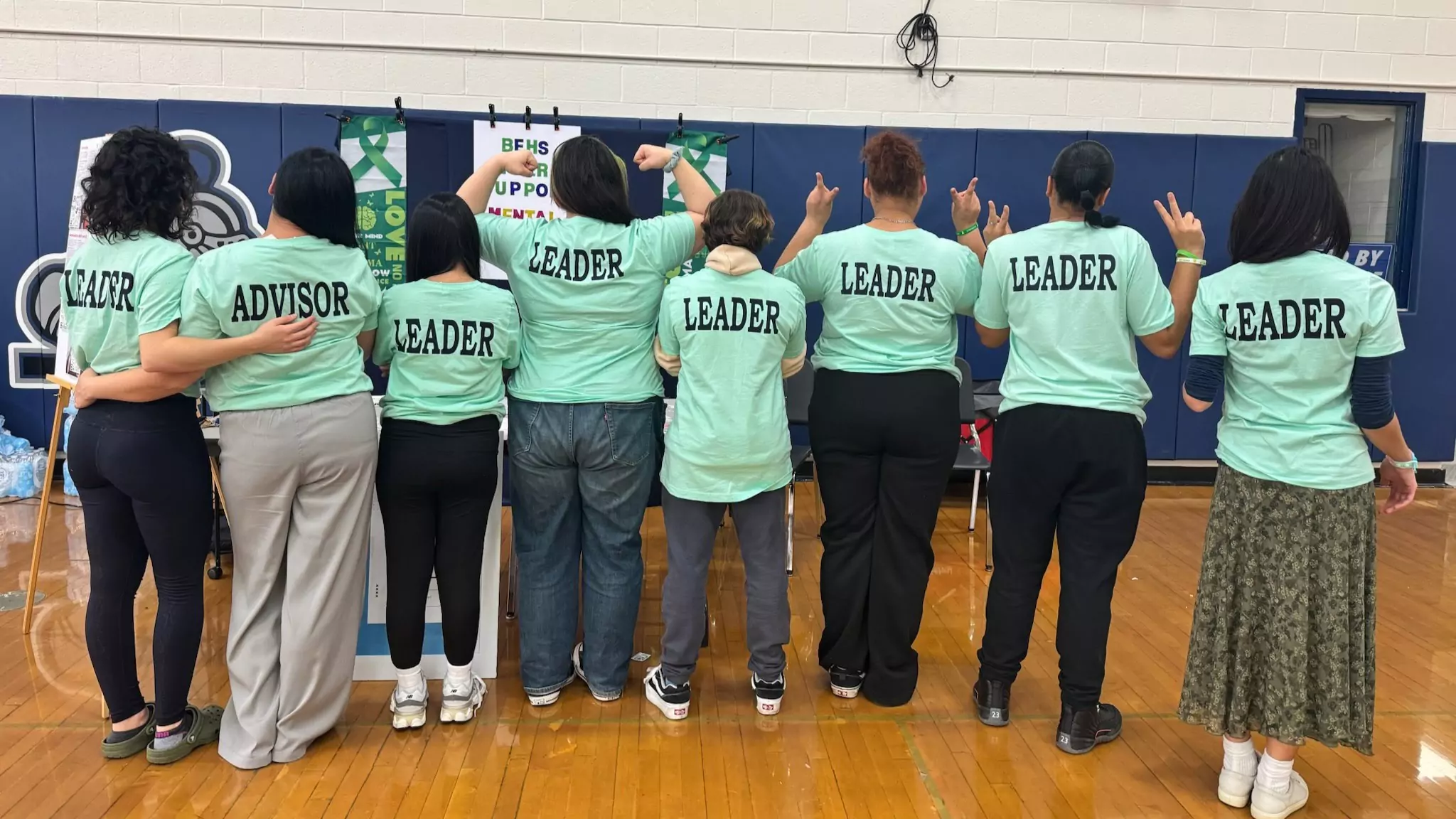 The Bristol Eastern High School peer support team posing with matching T-shirts at a student mental health event. The Bristol Eastern High School peer support team posing with matching T-shirts at a student mental health event.