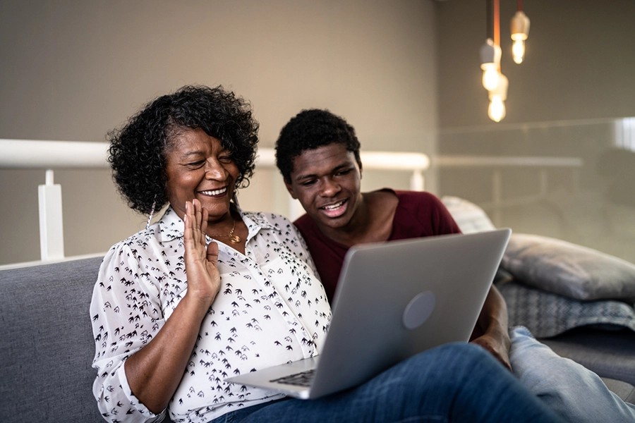 Mother and son looking at computer