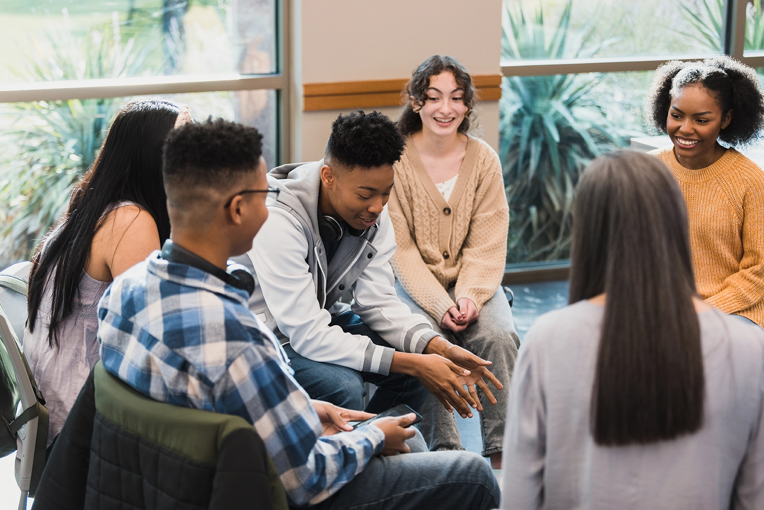 Peer Support Group of Kids in School Chatting